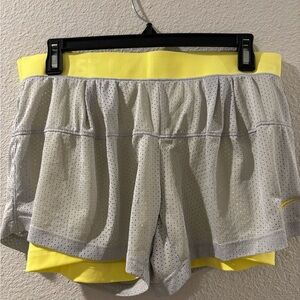 Nike Women's Athletic Shorts in Gray and Yellow